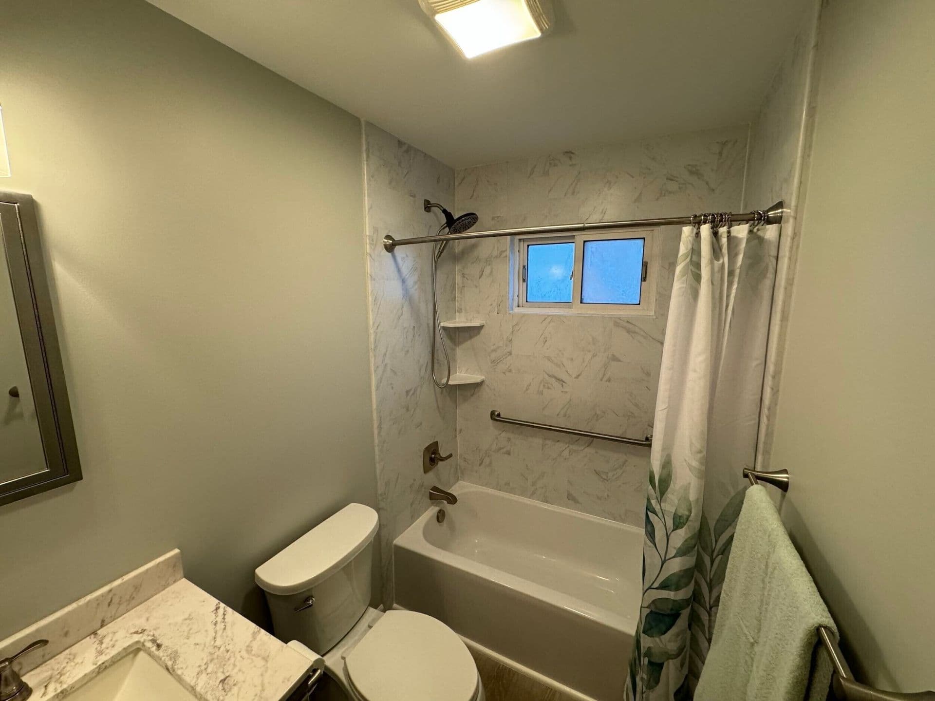A bathroom after a one day bathroom transformation by Kurtis Kitchen and Bath.