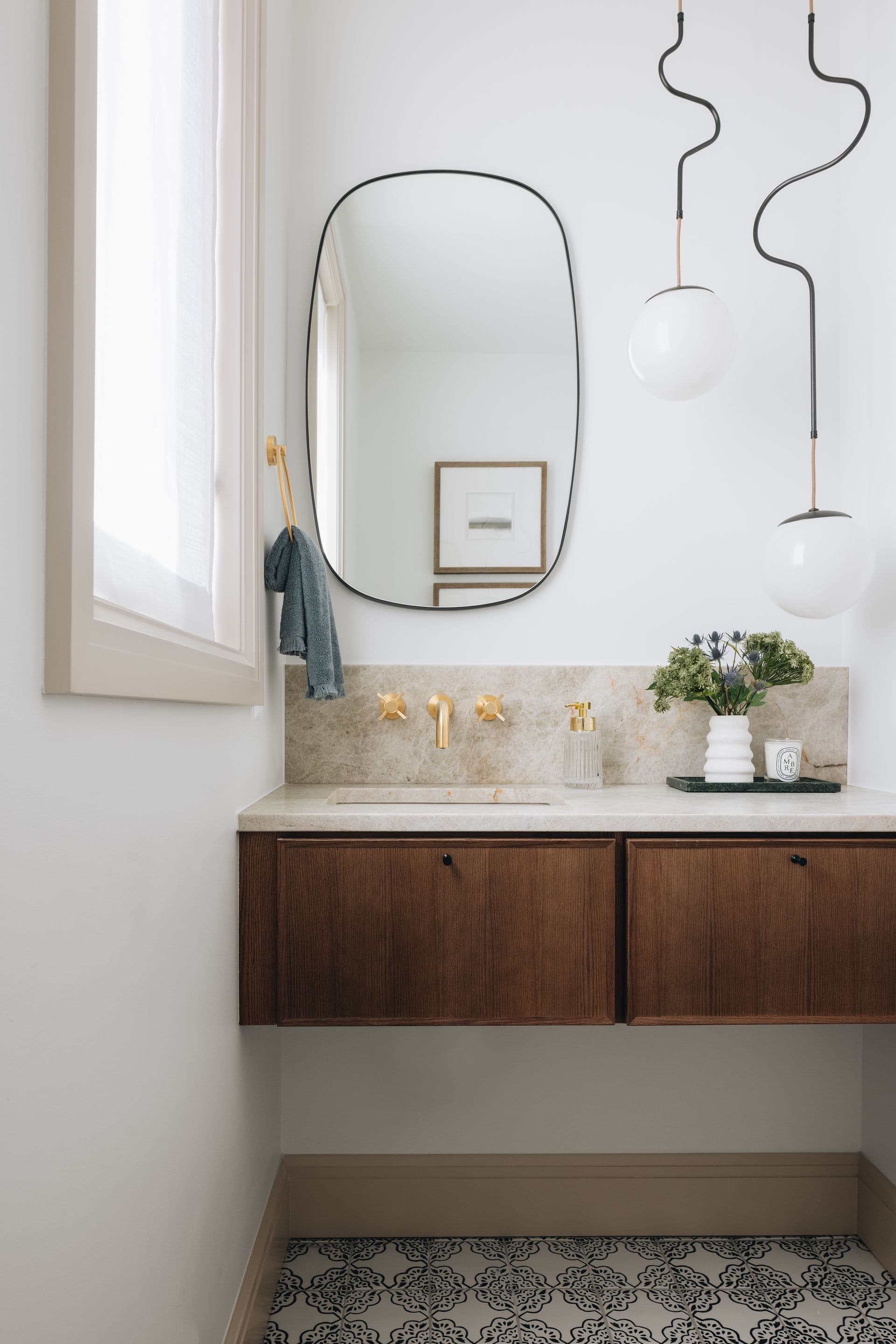 Elegant Powder Room with warm tones
